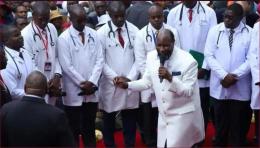 Holiness and Repentance Ministries founder David Owuor parades medics who validated claims of faith-based healing of HIV/AIDs.